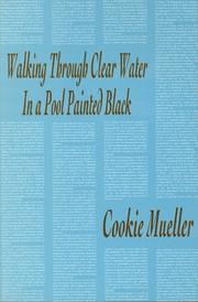 Walking through clear water in a pool painted black cover